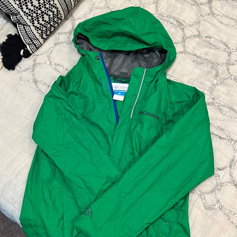 Kids size medium green Columbia rain jacket. Like new.